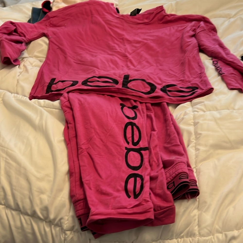 Bebe long sleeve and long pants PJ set in hot pink with black letters.